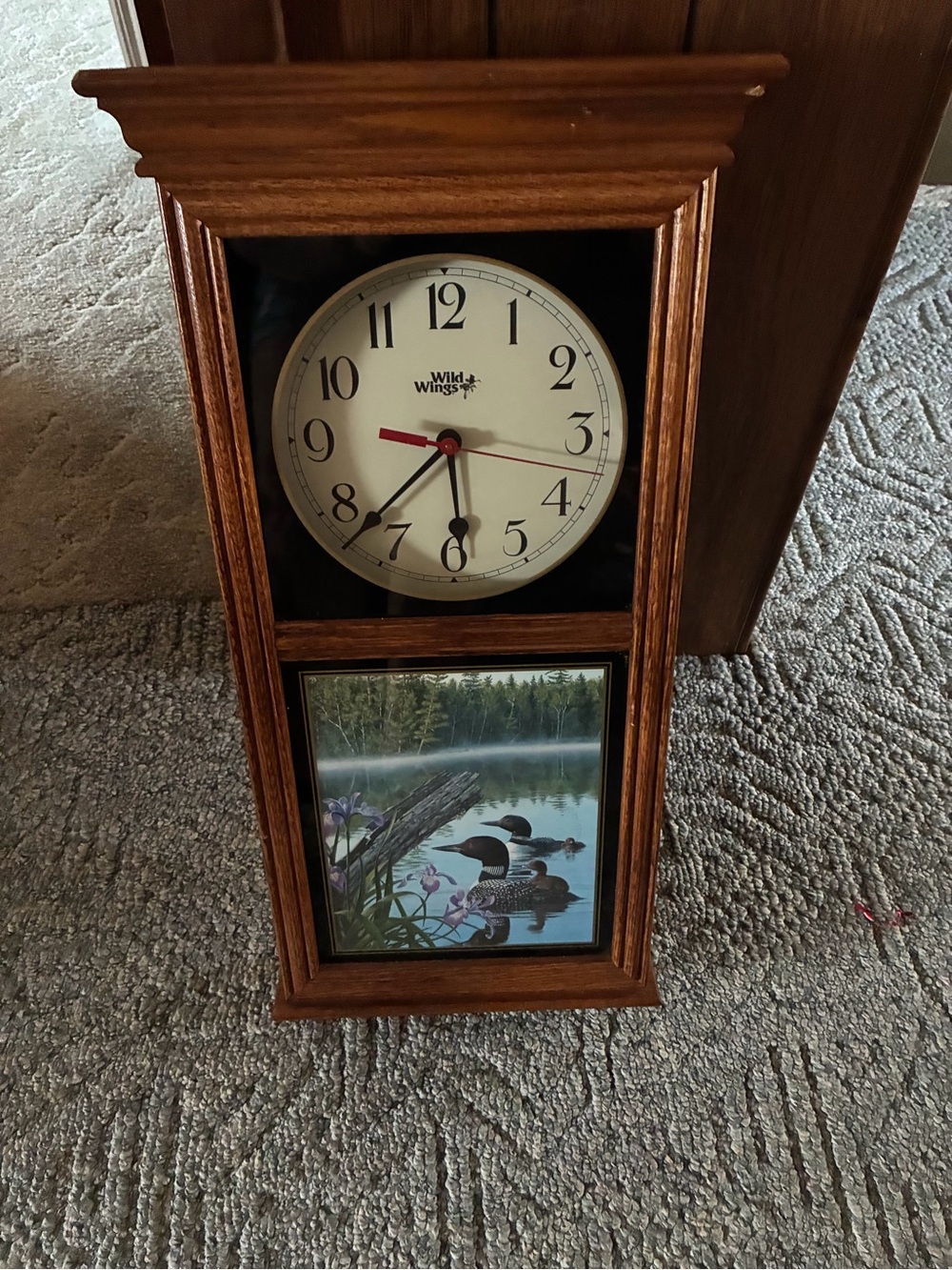 Brown Wooden Wall Clock with loon’s Art